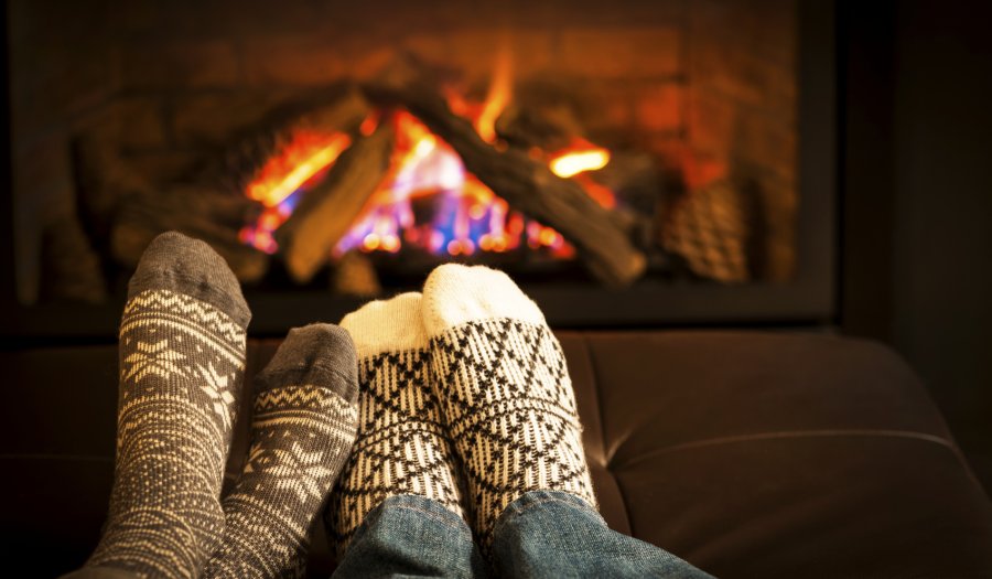 Romantic getaway, relaxing by a cozy fireplace