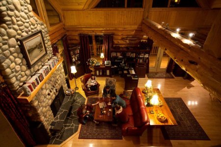 Grand room with fireplace at Riverside Chateau