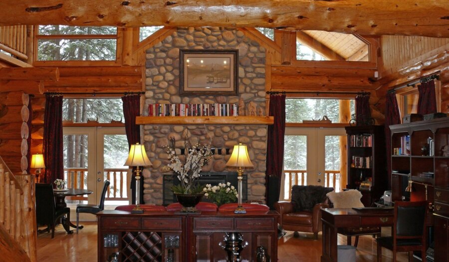 Grand room with fireplace at Riverside Chateau