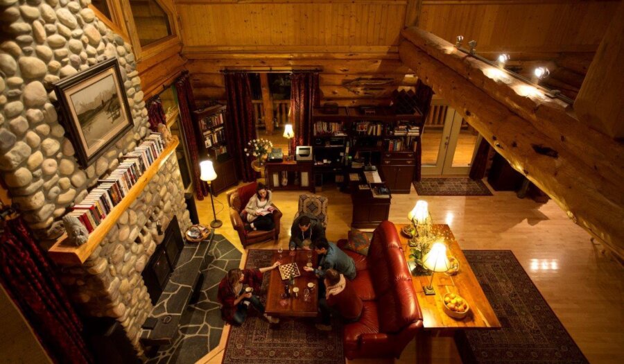 Grand room with fireplace at Riverside Chateau