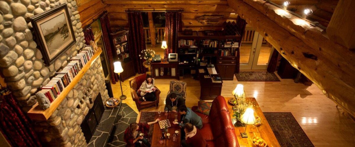 Grand room with fireplace at Riverside Chateau